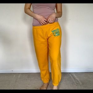 PINK Victoria’s Secret yellow sweatpants, size XS